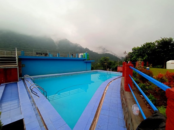 Swimming pool and mountain view in Rishikesh camps